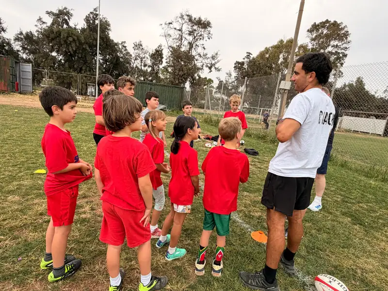 Young players listening to their coach